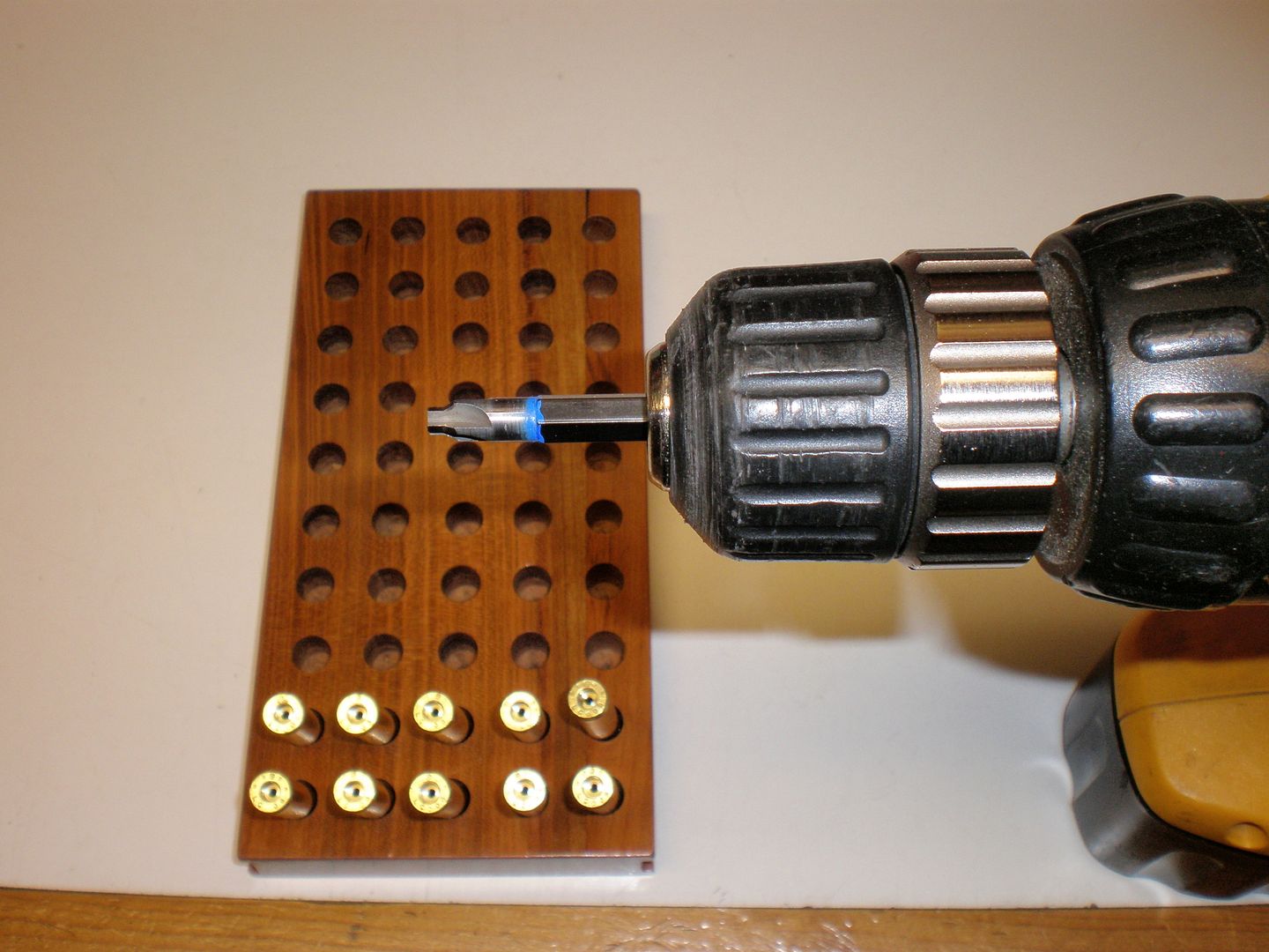 Removing primer pocket crimps