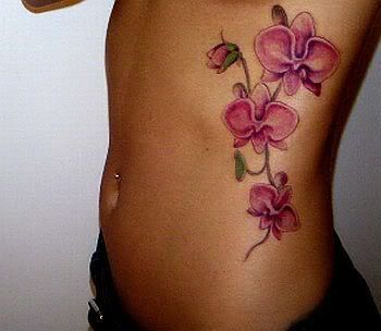 beautiful orchid tattoo on side