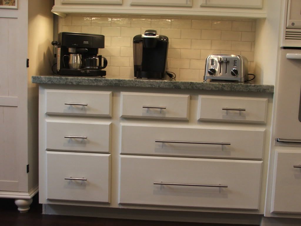 Finished! Costa Esmeralda/Creamy Budget Re-Do! Finished! Costa Esmeralda/Creamy Budget Re-Do! - We pulled the cabinets out even with the front of our fridge because we never used them before. Now they store our cereal! And I added a couple of shelves ...